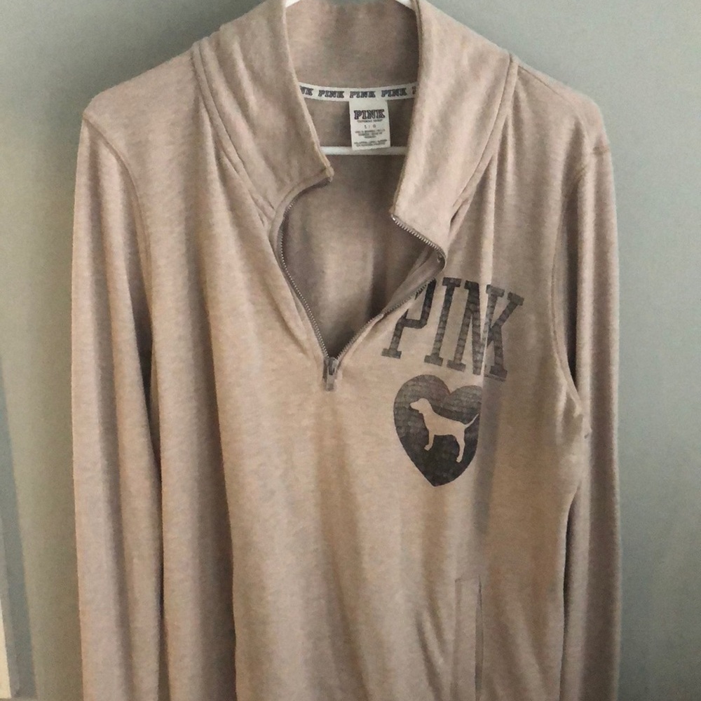 PINK zip up sweatshirt.